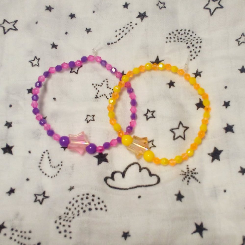 Handmade Bracelets with little beads and a star.